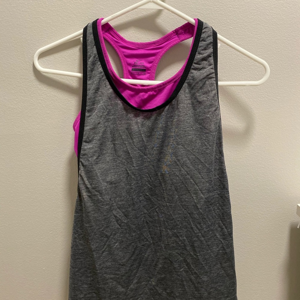 Nike athletic tank top with bra included.